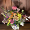 &ldquo;Tropical Texas Breeze," a captivating floral fusion where the untamed beauty of