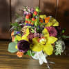 This small but mighty arrangement packs a big punch of color 