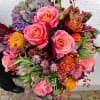 Exotic tropicals meets the world of soft and lovely roses  