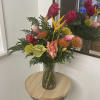 Exotic selection of Tropical Florals in a vase  this floral arrangement