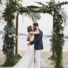 A exotic mix of tropical foliage  displayed on a Archway