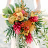 Tropical wedding memories bouquet this arrangement  with haku The bridal bouquet