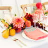 This beautiful display of tropical florals  This floral arrangement with a