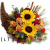 Autumn bouquet with sunflowers, roses, and a woven horn-shaped basket