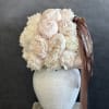Pure white peonies arranged with timeless elegance &mdash; a symbol of grace