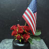 Spray roses, flag, stylish Gio vase. Very petite arrangement approximately 5 inches