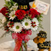 Beautiful graduation flower arrangement handcrafted with fresh red roses, white daisies and