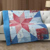 50 x 60. Quilt with floral pattern with red, blue and white