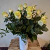 Elegant and timeless, our White Roses in a Vase offer a soft