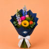 A custom graduation bouquet designed for Flower Mound High School seniors. Wrapped