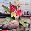 A refined tropical arrangement designed with sculptural elegance and exotic softness. Glossy