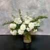 All white arrangement in glass vase