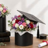 A modern graduation arrangement designed to celebrate dreams, accomplishments, and exciting new