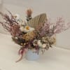 A soft, sculptural bouquet of dried botanicals that brings lasting texture and
