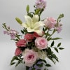 Rosy Daydream is a soft and romantic arrangement designed with delicate shades