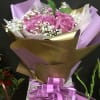 Lavender roses with baby breathe in lavender &amp; gold wrapping 