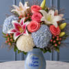 A breathtaking luxury arrangement featuring blush pink roses, elegant white and stargazer