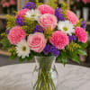 Elegant, cheerful, and delicately romantic, Jardin Ros&eacute; is a charming garden-style arrangement