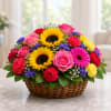 Bright, cheerful, and full of color, this stunning basket arrangement is designed