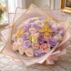 The blushing butterfly dreams bouquet is a whimsical and elegant floral design