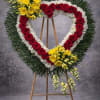 A bold and heartfelt standing heart designed with rich red roses outlining