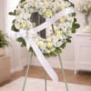 The Peaceful Garden Wreath is a graceful and comforting tribute designed to