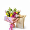 Indulge in a flower-inspired softcover fiction novel paired with a stunning large