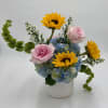 Sunbeam is a bright and modern floral arrangement designed to capture the