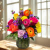 Bright Colorful blooms in a vase to bring a smile to anyone's