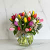 Bursting with color and joy, Radiant Tulips features a stunning mix of