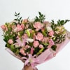 A lavish, hand-tied bouquet that reads like a love letter in soft