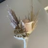 Boutonniere with a pale calla lily and dried grasses