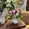 Spring roses and viburnum arrangement