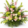 Soft pink roses and airy hydrangea tones give this large sympathy arrangement