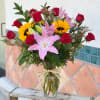 A dozen red roses to tell her you love her. 
Sunflowers are