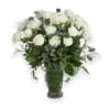 White rose bouquet in a clear glass vase