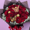 A lush dome of two dozen classic red roses makes an unmistakable