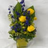Select this tall vase arrangement in a yellow cube to celebrate new