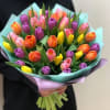 Brighten any day with our Tulips Boutique, a delightful arrangement of fresh