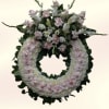 A soft halo of pale pink and white creates a gentle, reverent