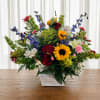 A bright, garden-fresh centerpiece that reads like a celebration in bloom-this large