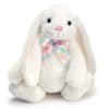 A cuddly white plush bunny with long floppy ears creates an immediate
