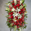 Standing floral spray with red roses and white lilies