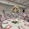 A tall banquet centerpiece that reads like a pastel celebration-this event flower