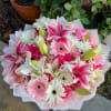 Pink and white bouquet with lilies, gerbera daisies, and roses