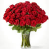 Bouquet of red roses in a clear glass vase