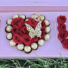 A heart of red roses set inside a pastel pink presentation box-this