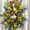 Bright, high-contrast blooms make a lasting impression with this large standing spray
