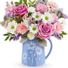 Soft and serene, this Pastel Meadow Bouquet brings the beauty of a