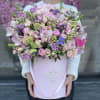 Mix of fresh flowers in pink box this arrangement will be a